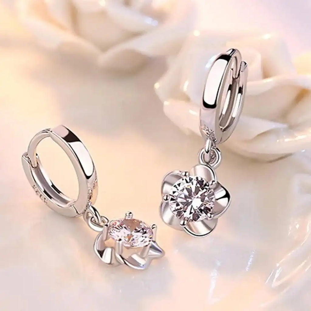 Pendientes de plata de ley con circonitas moradas y blancas