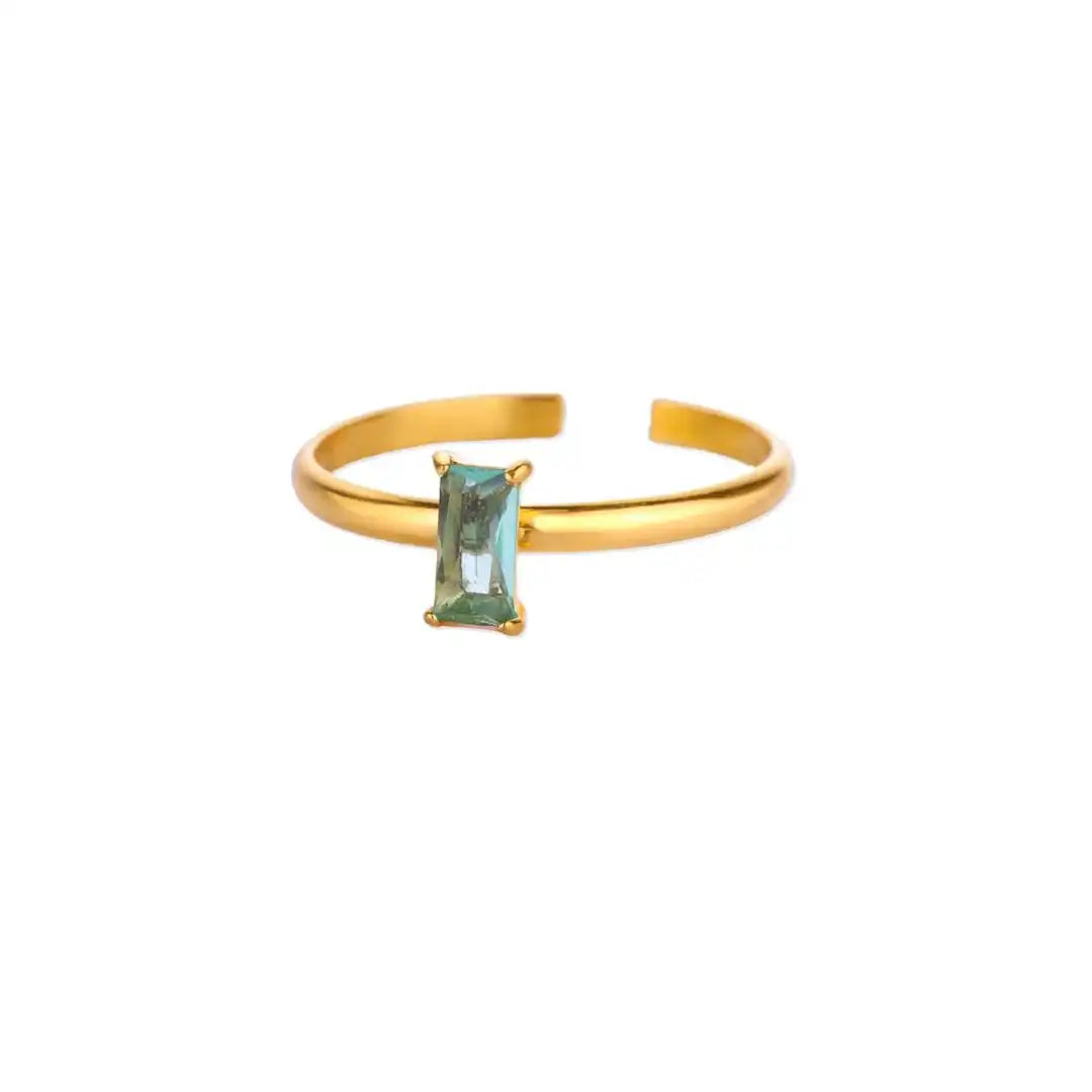 Anillo dorado ajustable y delicado con gema de colores