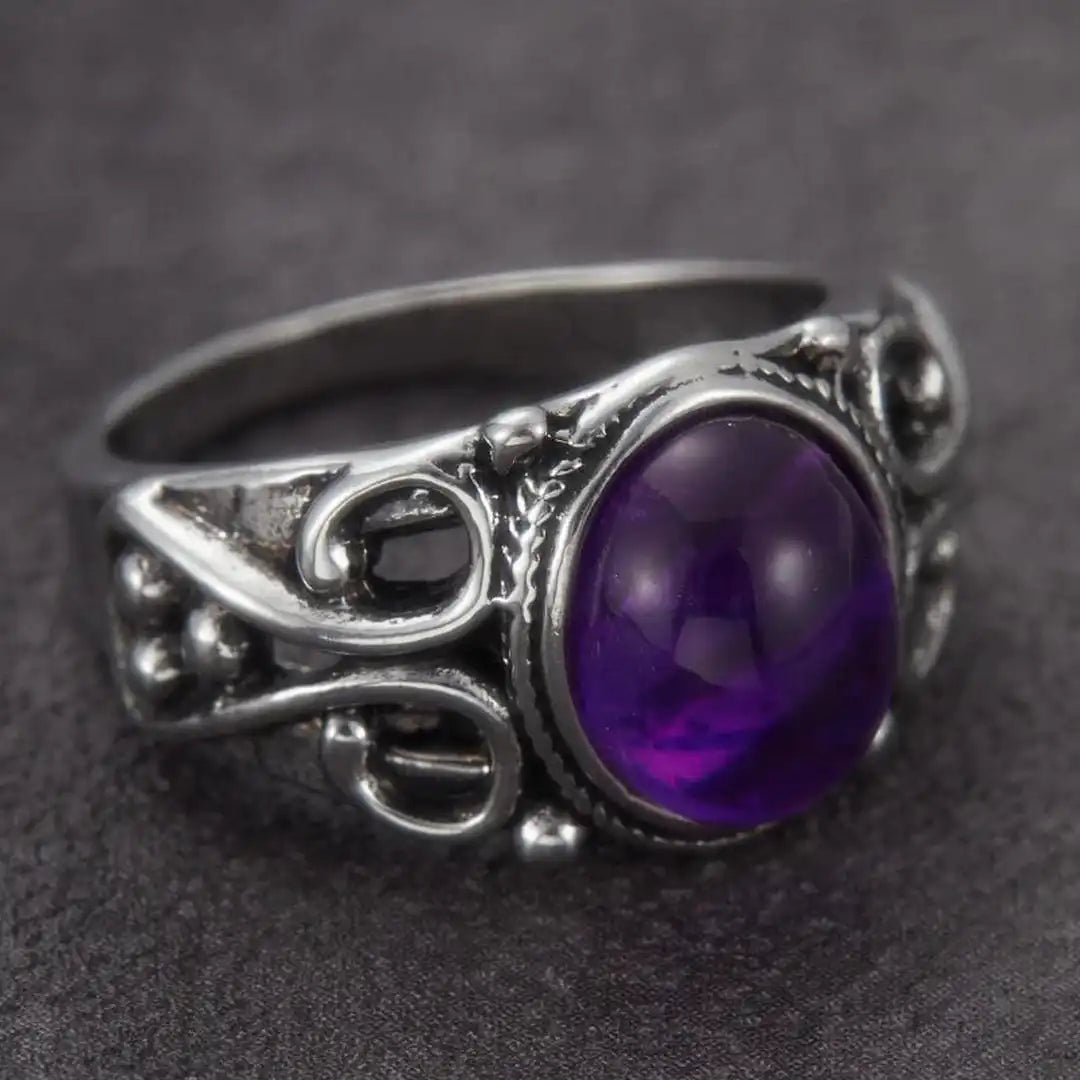 Anillo ovalado de pergamino plateado y morado clásico