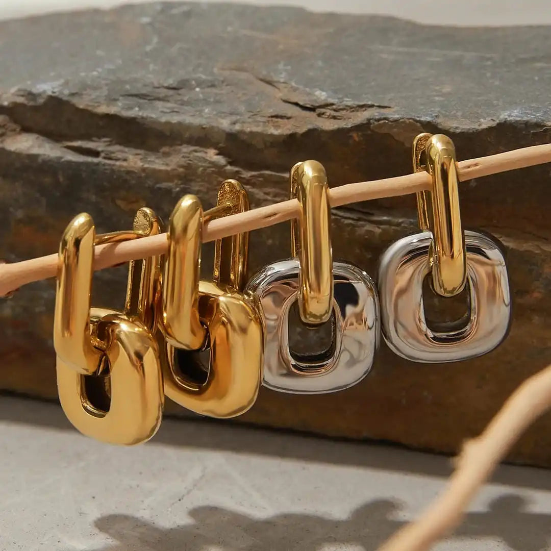 Pendientes ovalados minimalistas de oro de dos tonos
