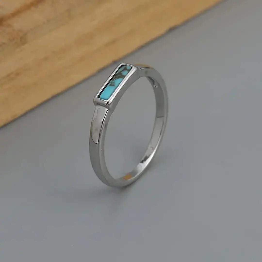 Anillo clásico de plata con barra de turquesa
