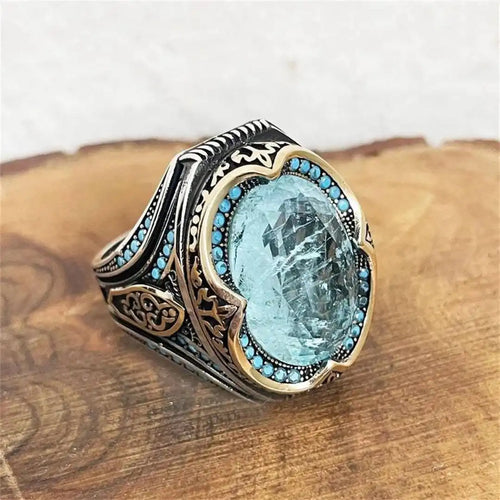 Anillo antiguo de plata con circonita azul