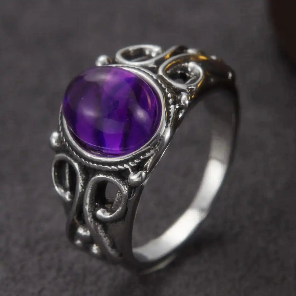 Anillo ovalado de pergamino plateado y morado clásico