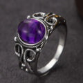 Anillo ovalado de pergamino plateado y morado clásico