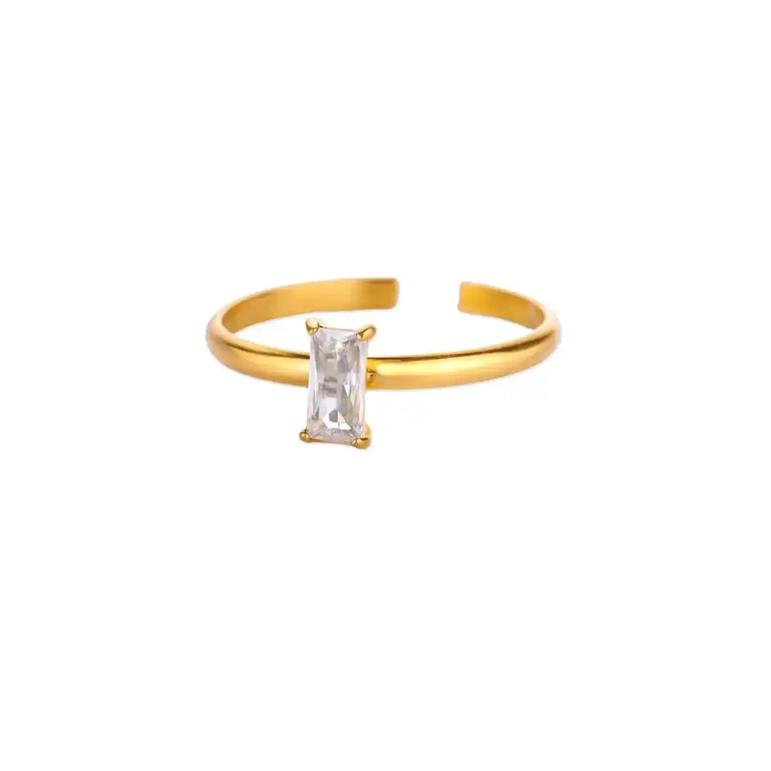 Anillo dorado ajustable y delicado con gema de colores