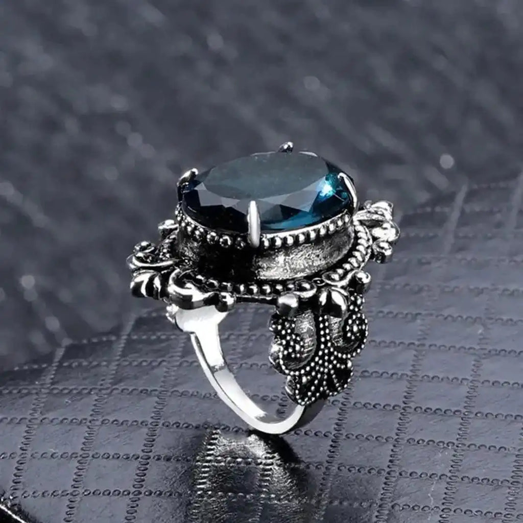 Anillo de circonita azul ovalado de plata vintage