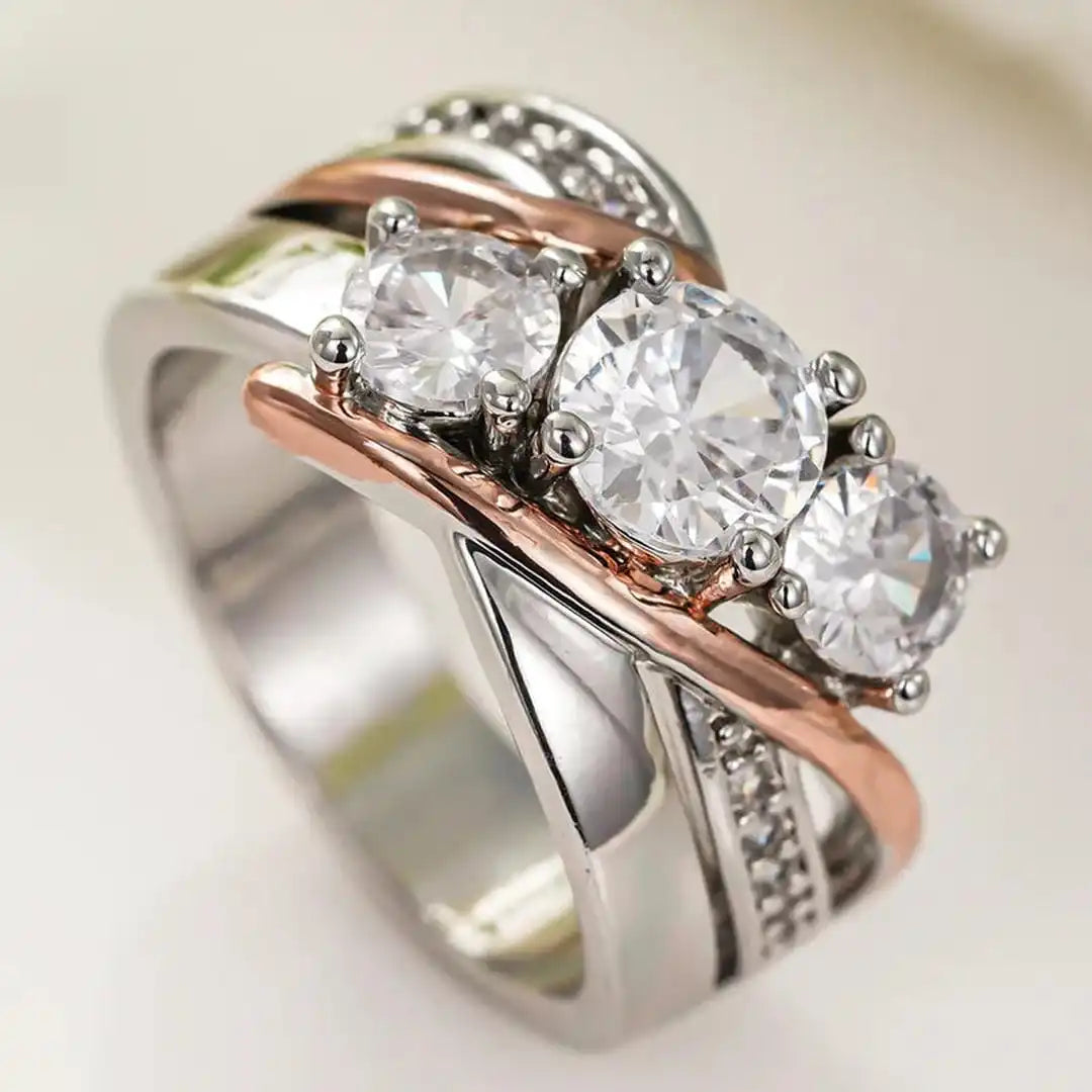 Anillo de circonita tridimensional de oro y plata