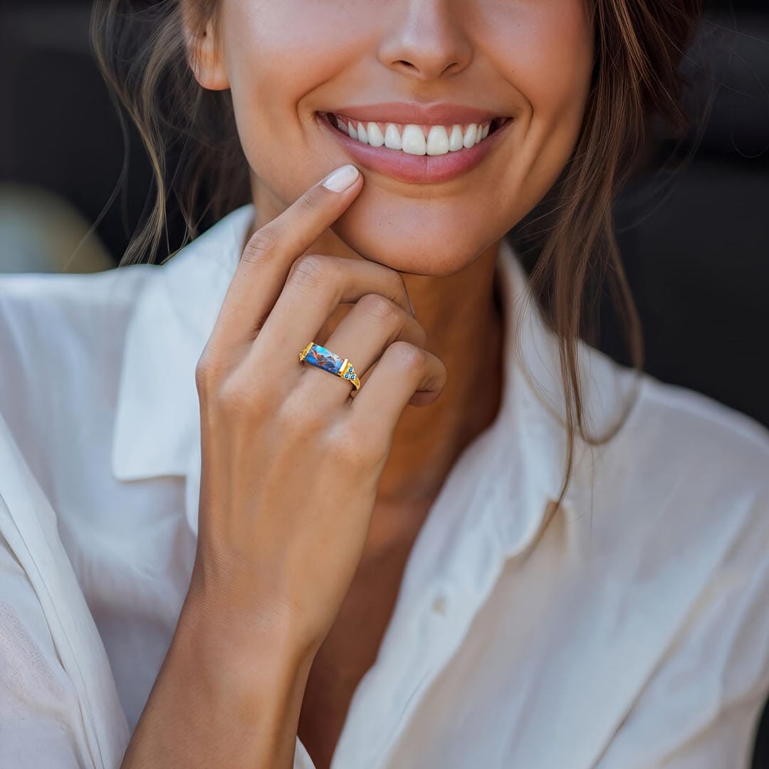 Anillo llamativo dorado con barra turquesa