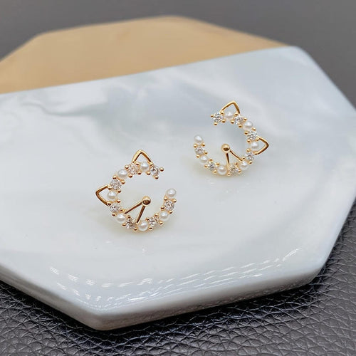 Pendientes de perlas redondos con orejas de gato