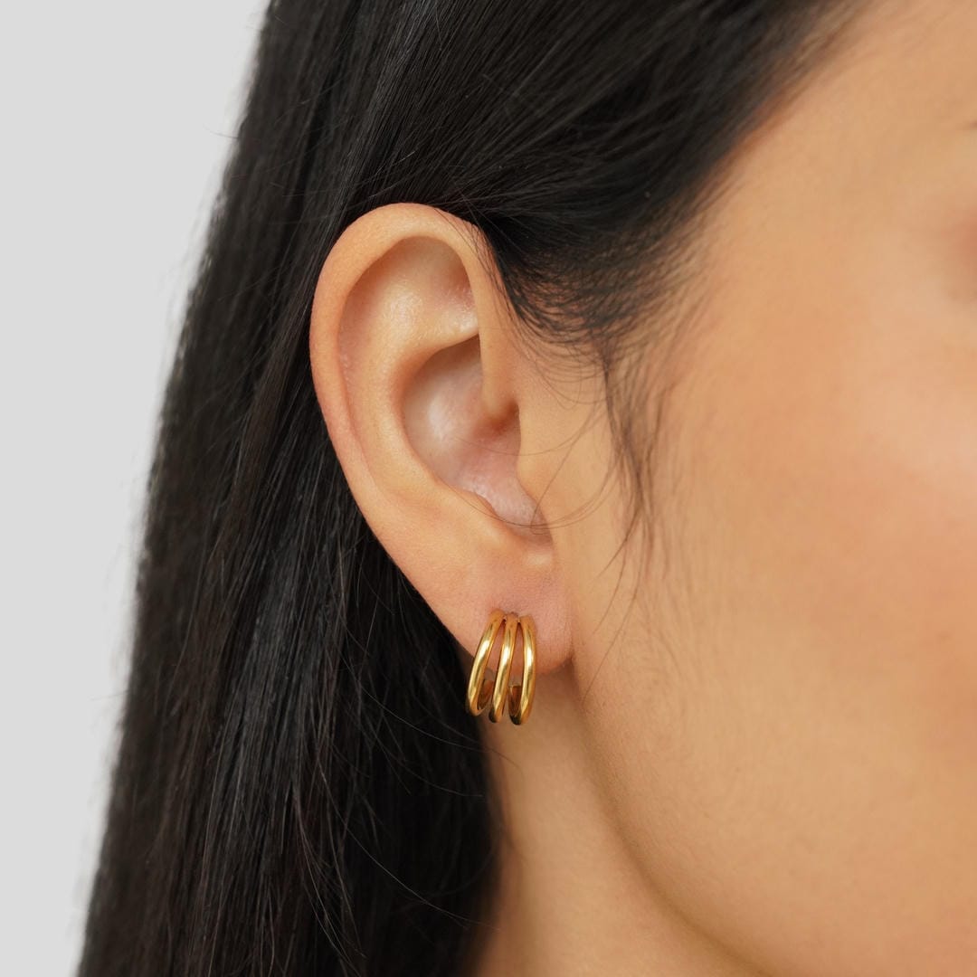 Pendientes de oro triple