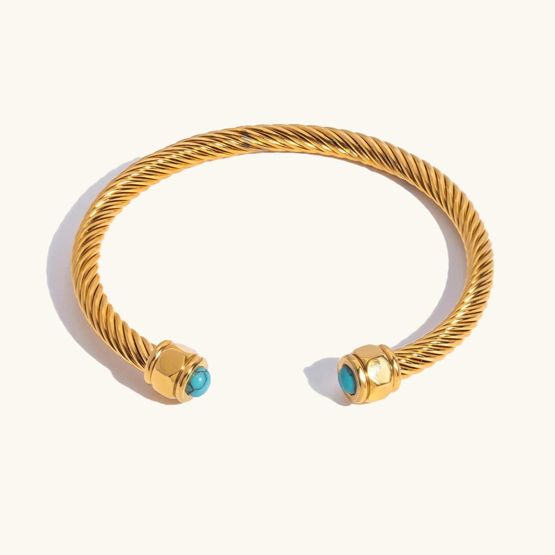 Pulsera de oro con gema