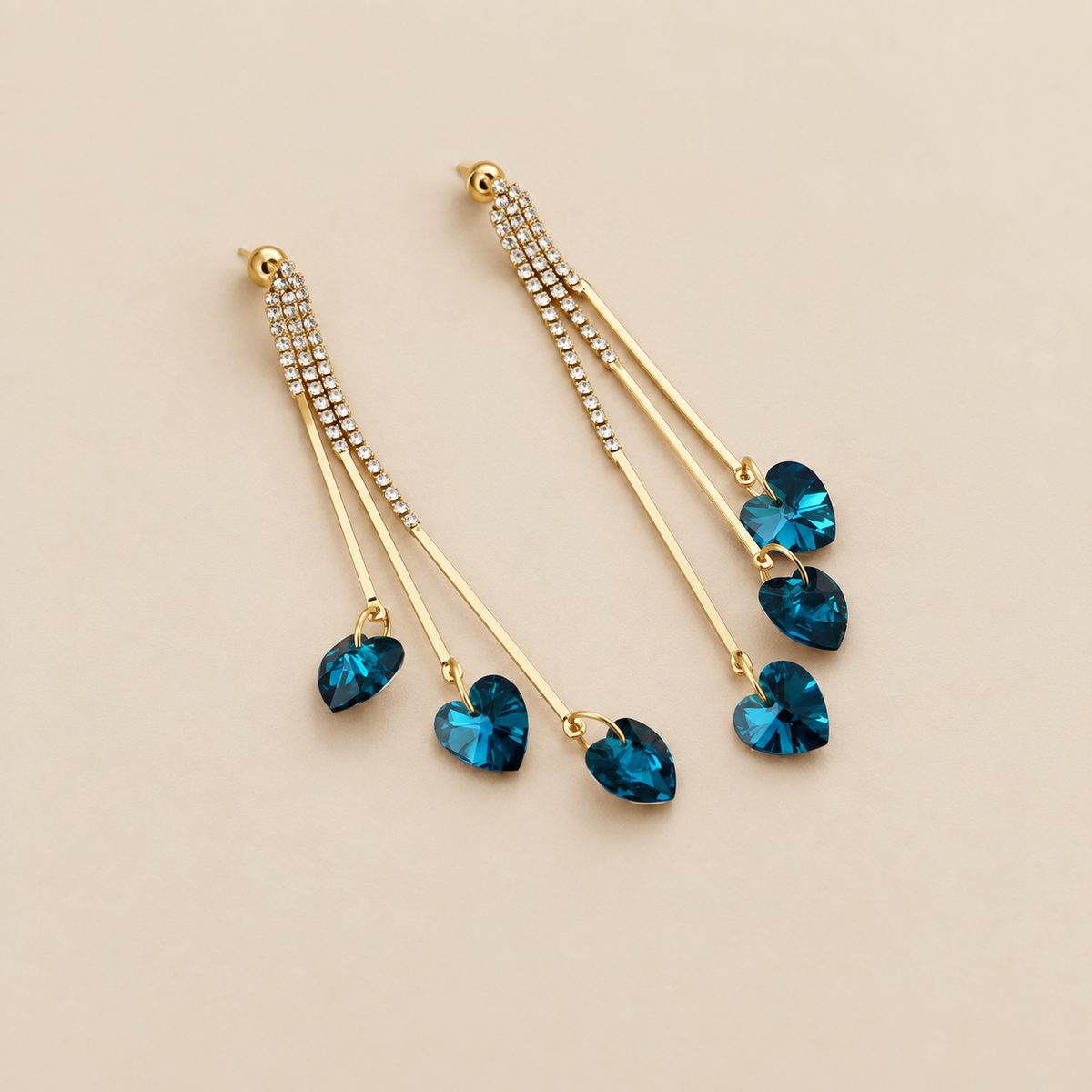 Elegantes pendientes de gota de lluvia de corazón de cristal azul