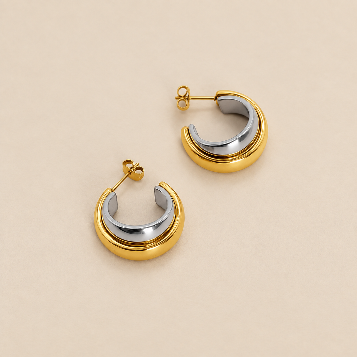 Elegantes pendientes de oro y plata de dos tonos