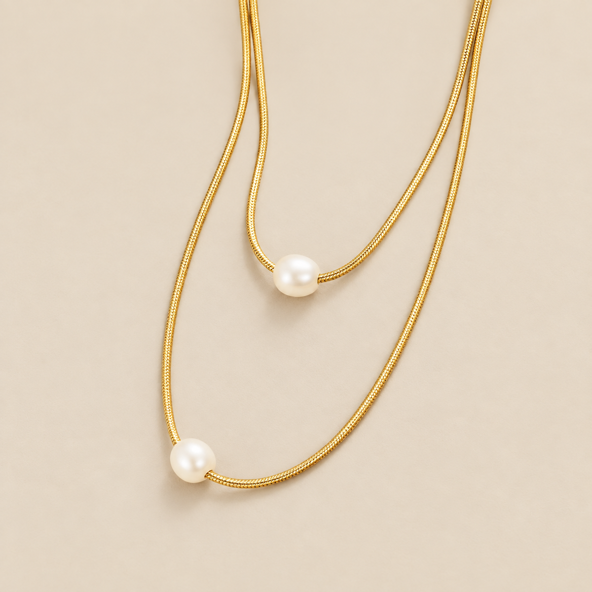Layered Freshwater Pearl Necklace — cream studio photograph