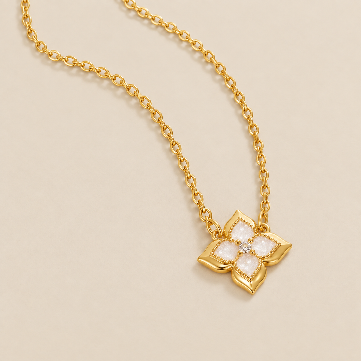 Dalia White Iris Clover Necklace — cream studio photograph