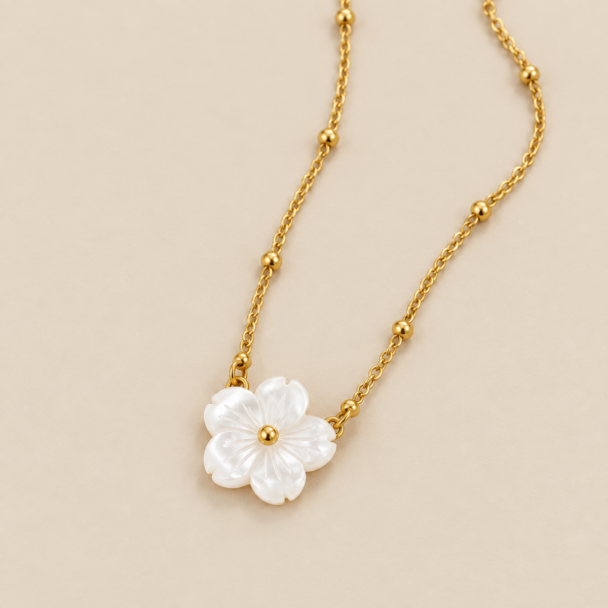 Greatness Bloom Flower Pendant Necklace — cream studio photograph
