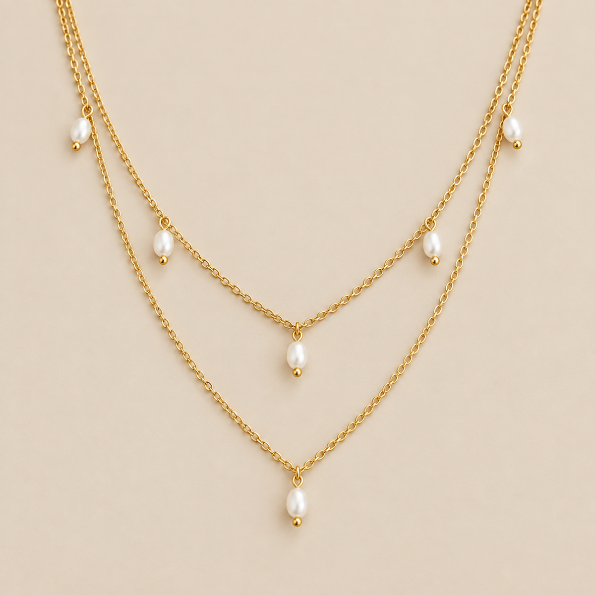 Kayla Pearl Drop Layered Necklace — cream studio photograph