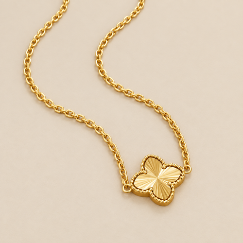 Amara Clover Pendant Necklace — cream studio photograph
