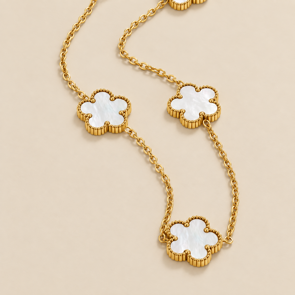 Pearl Shell Clover Necklace — cream studio photograph