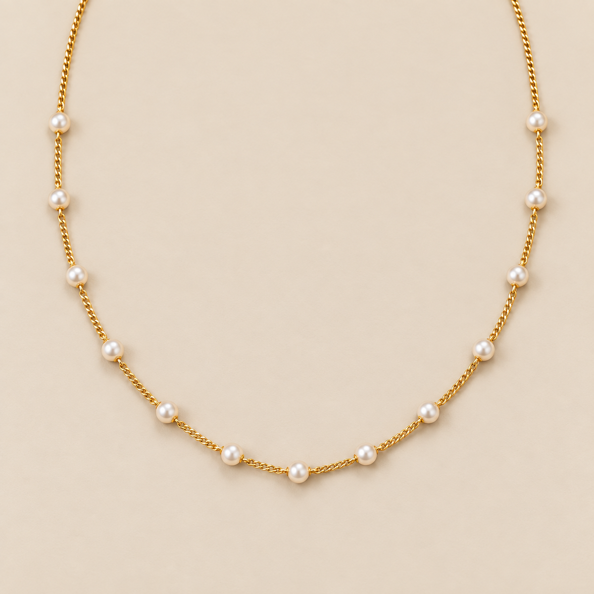 Elegant Small Pearl Necklace — cream studio photograph