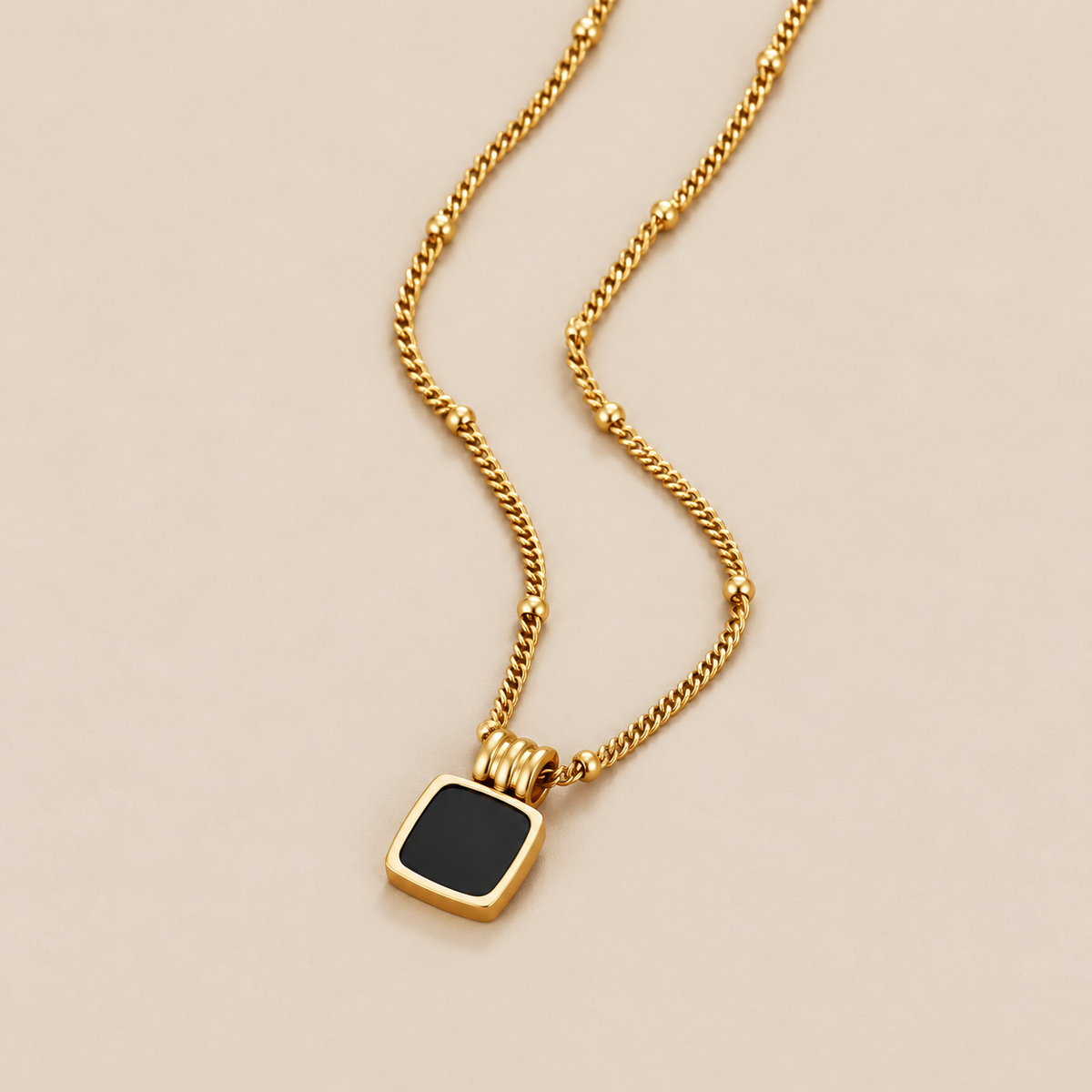 Midnight Chic Black Pendant Necklace — cream studio photograph