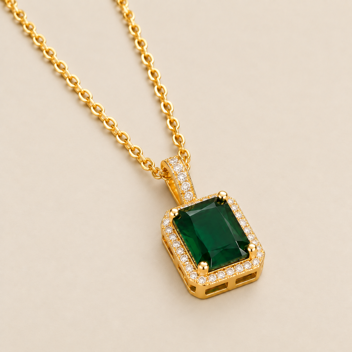 Emerald Crystal Gold Necklace — cream studio photograph