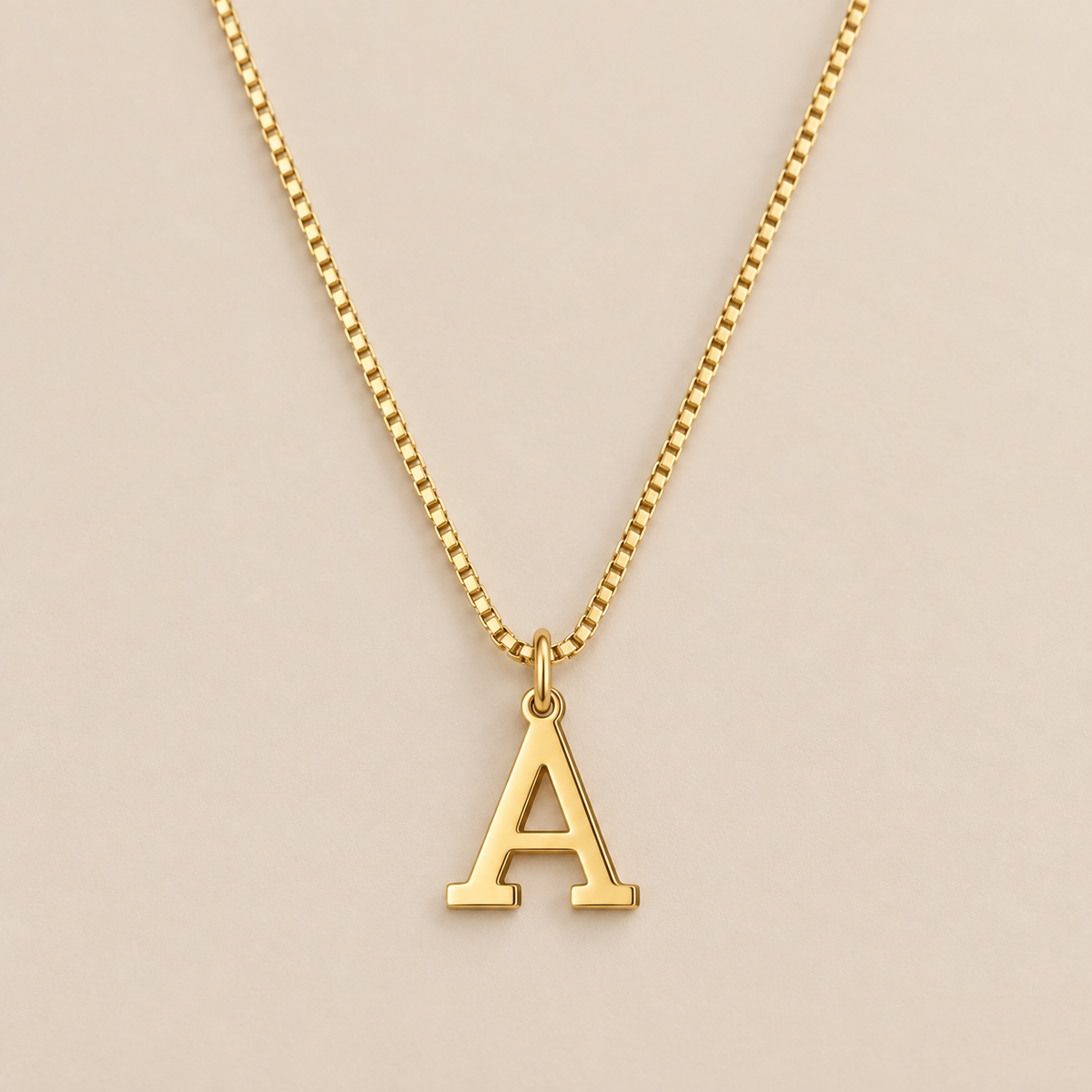 Vintage Letter Initial Gold Necklace — cream studio photograph