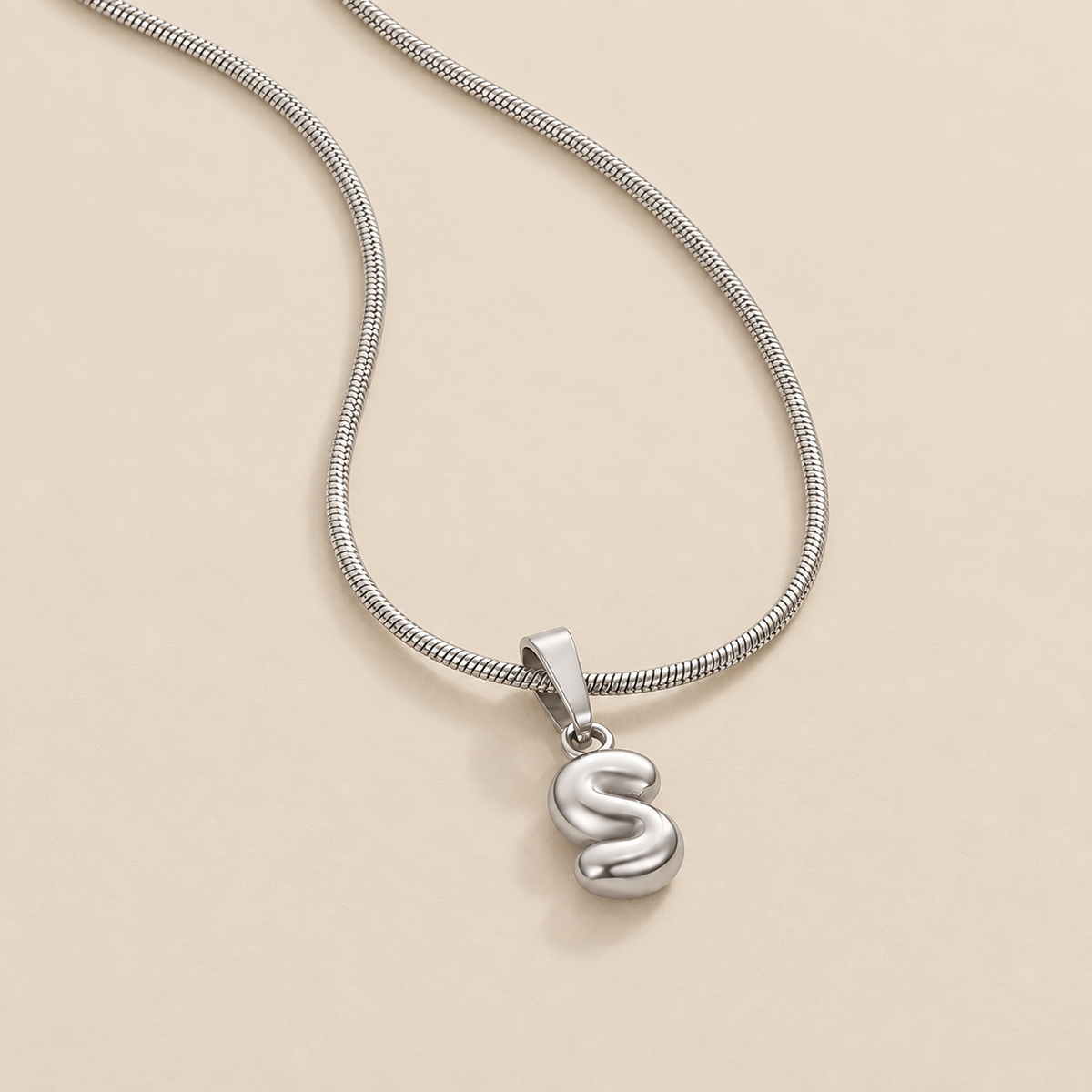 Bubble Letter Necklace – Silver — cream studio photograph