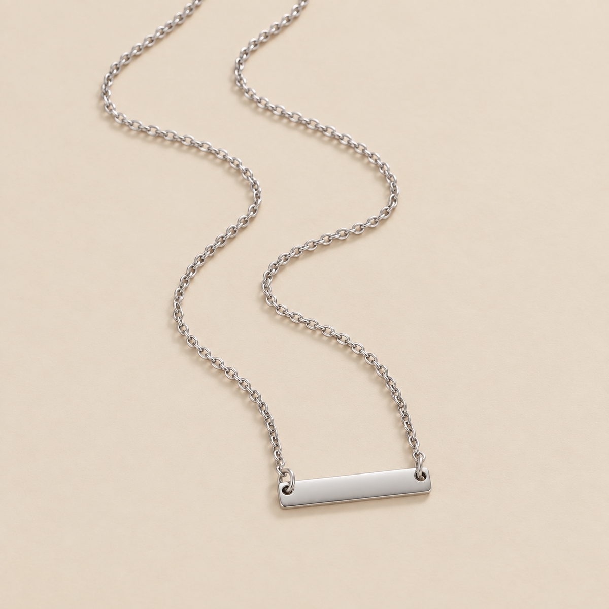 Rina Silver Bar Necklace — cream studio photograph