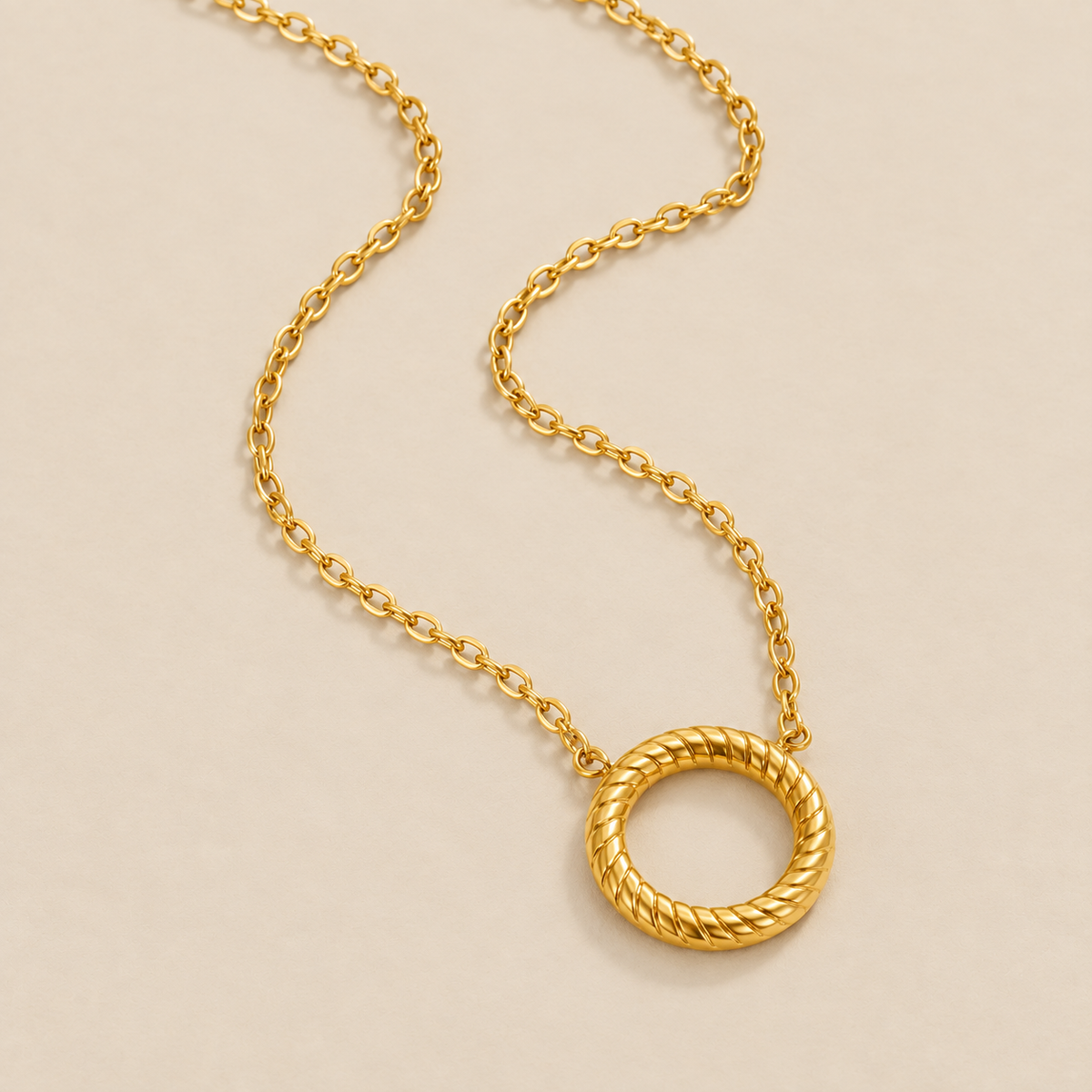 Avery Circle Pendant Necklace — cream studio photograph
