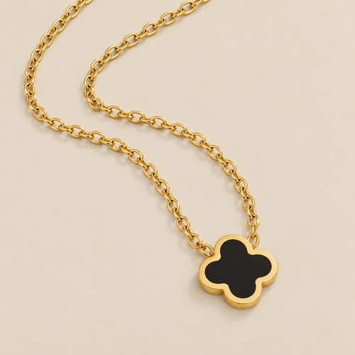 Black Clover Necklace — cream studio photograph