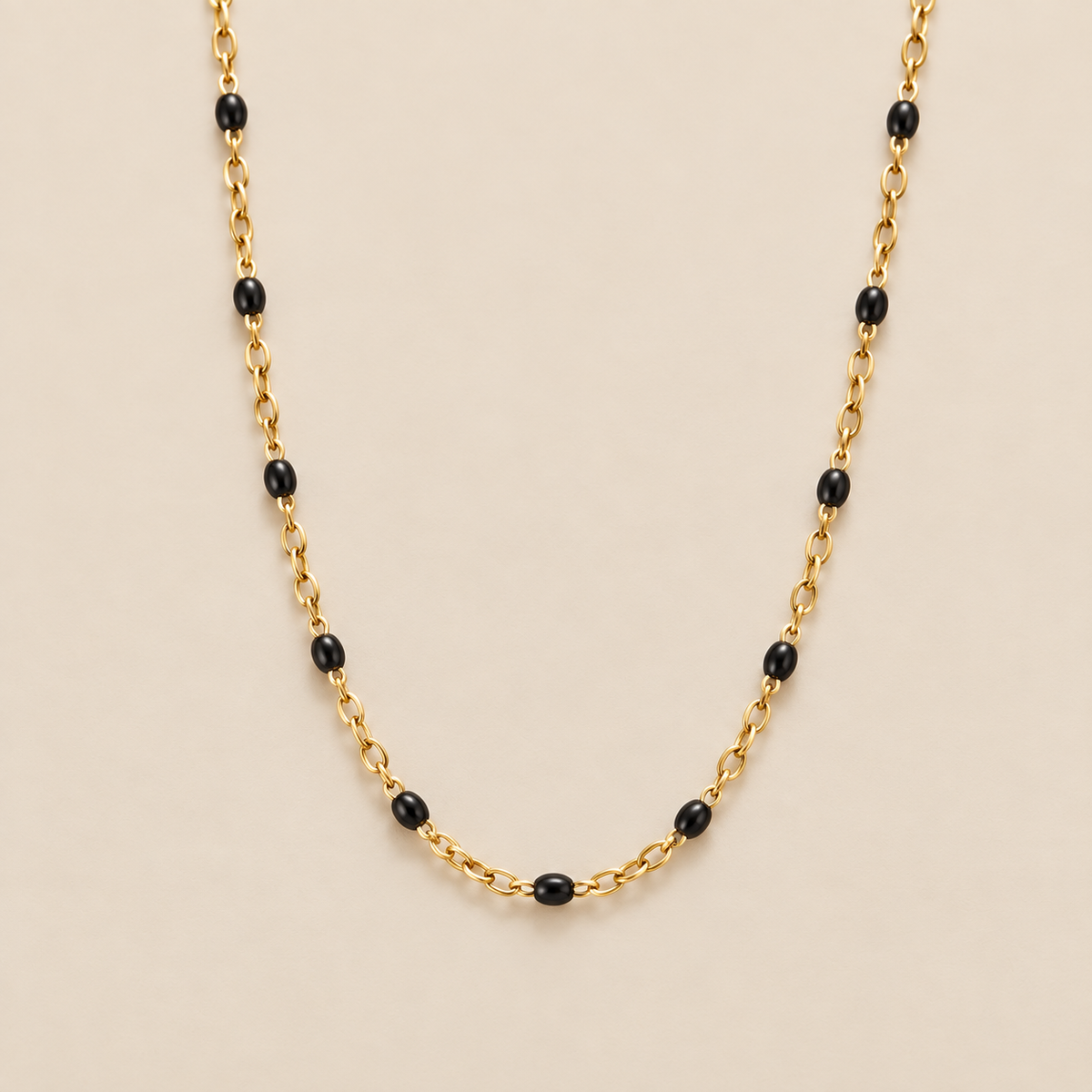 Mila Black Bead Necklace — cream studio photograph