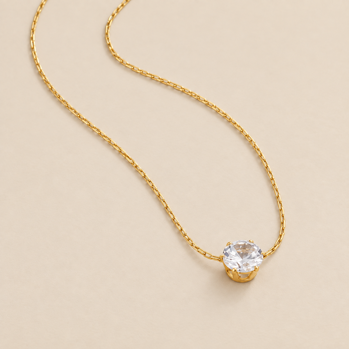 Dainty Round Crystal Necklace — cream studio photograph