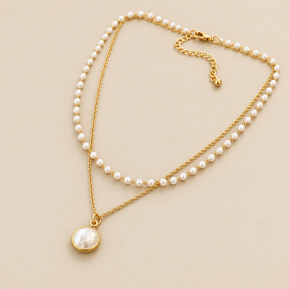 Lustrous Pearl Necklace — cream studio photograph
