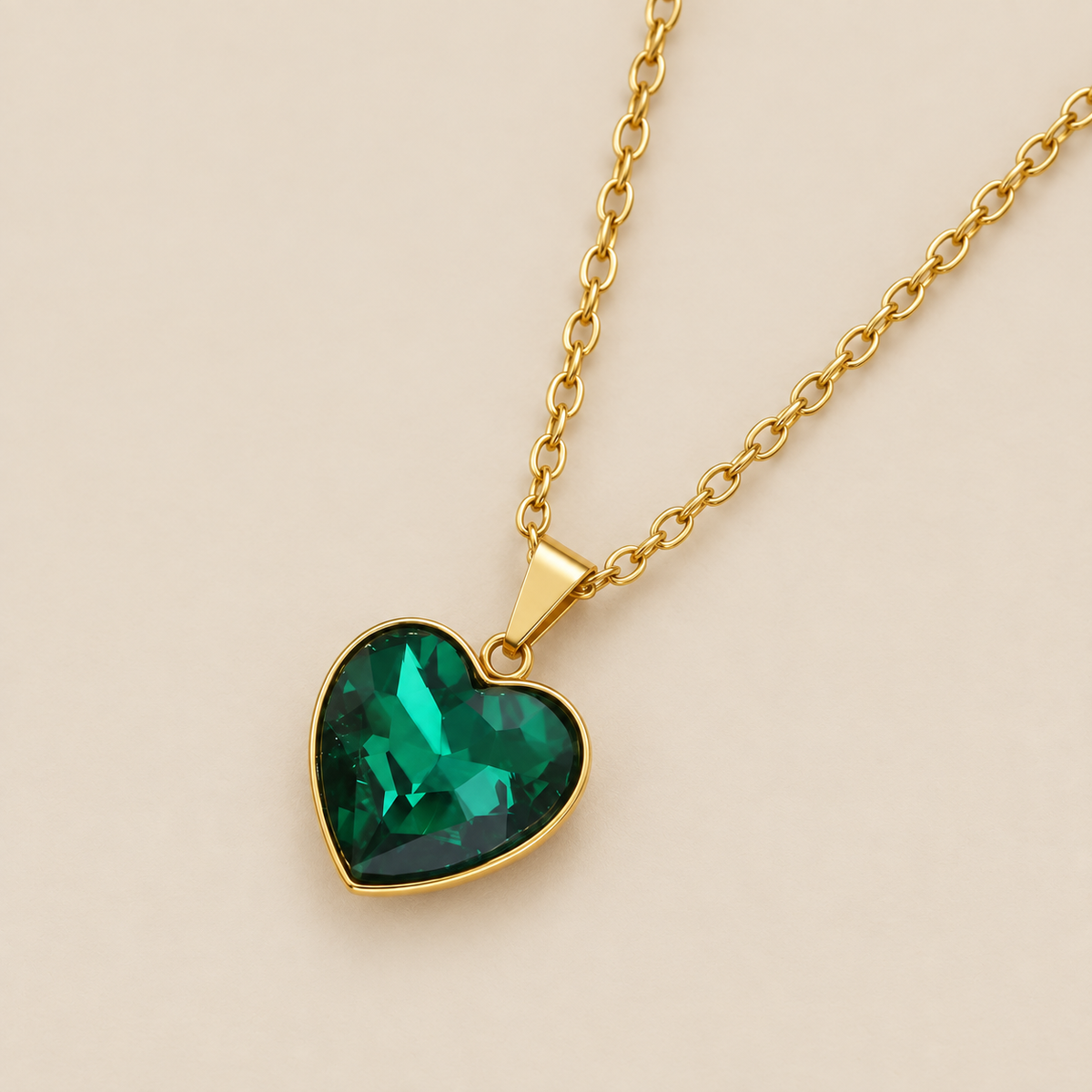 Emerald Heart Pendant Necklace — cream studio photograph