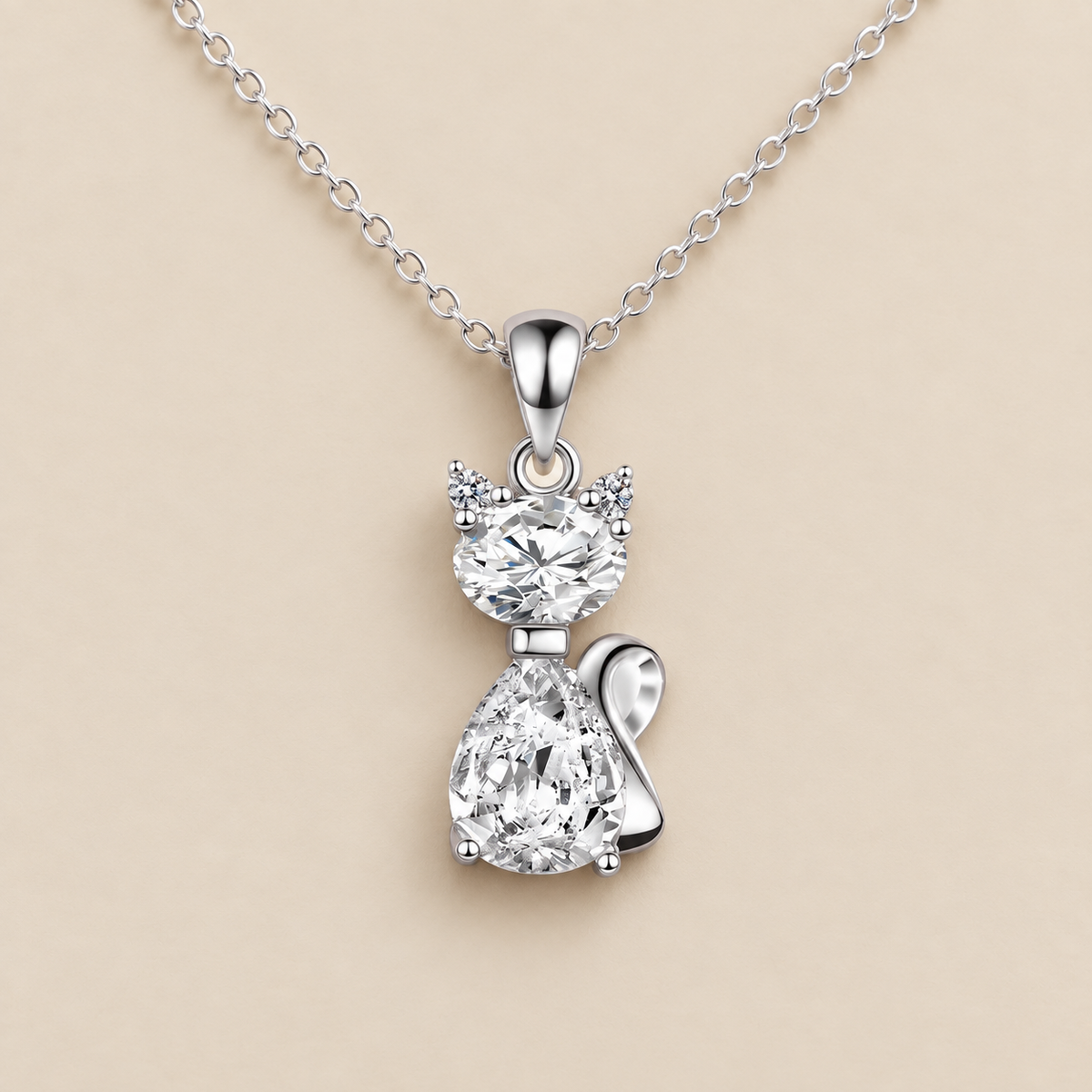 Sterling Silver Zirconia Feline Necklace — cream studio photograph