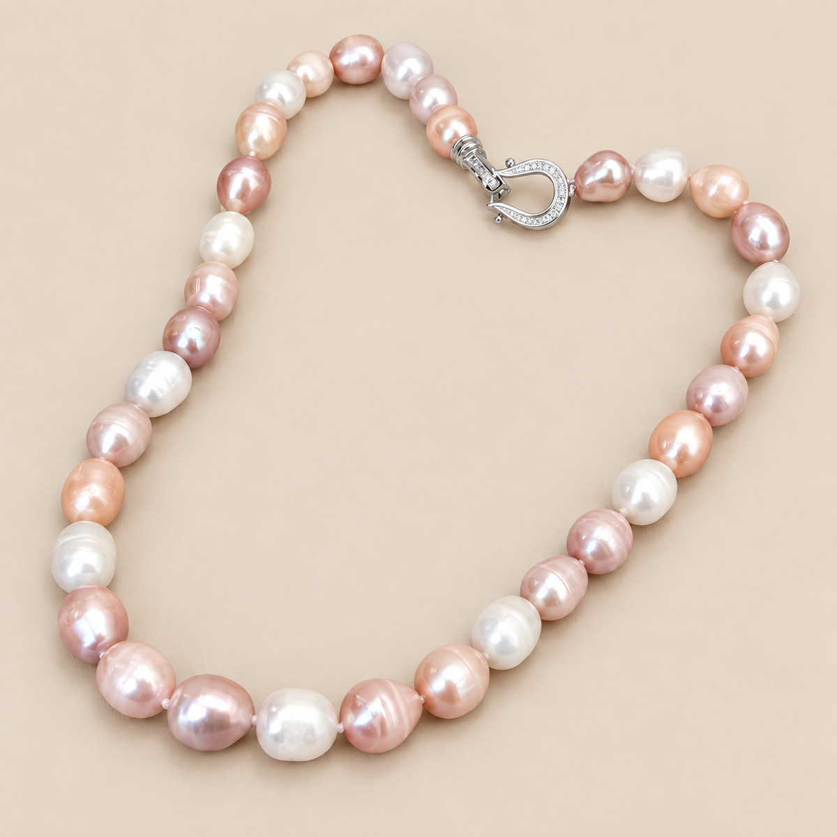 Elegant Colored Pearl Necklace — cream studio photograph