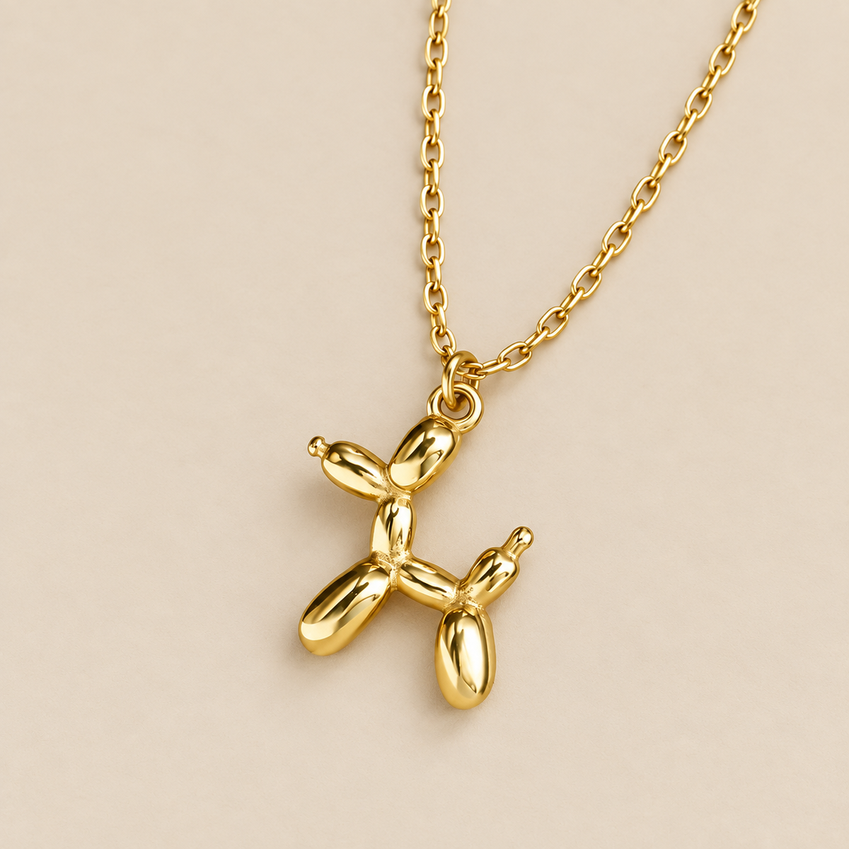 Dog Balloon Charm Necklace — cream studio photograph