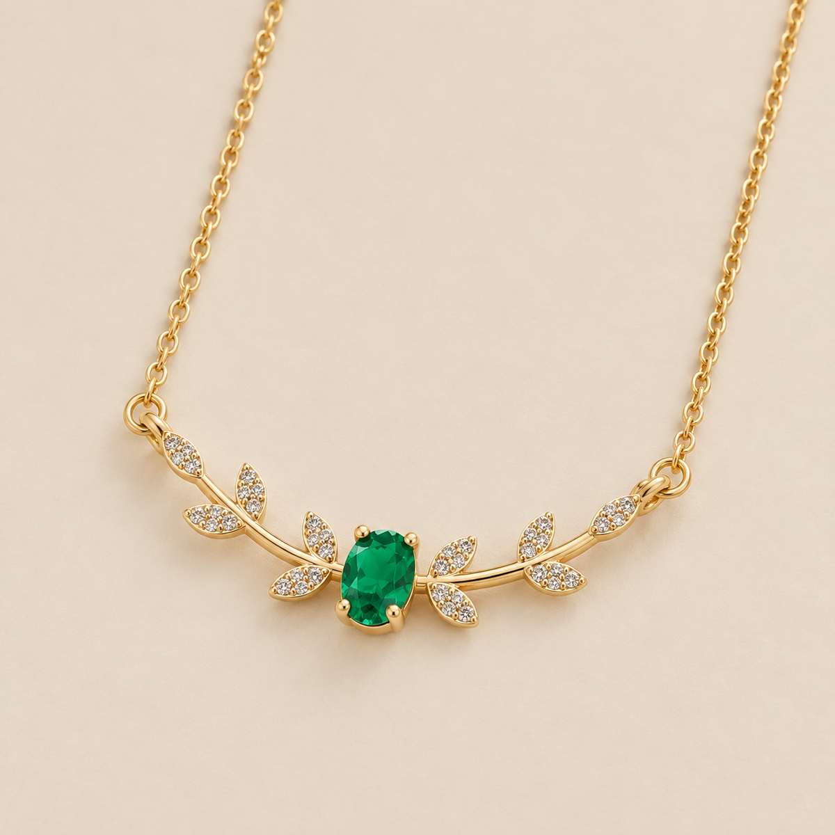 Classic Emerald Marquise Leaf Pendant — cream studio photograph