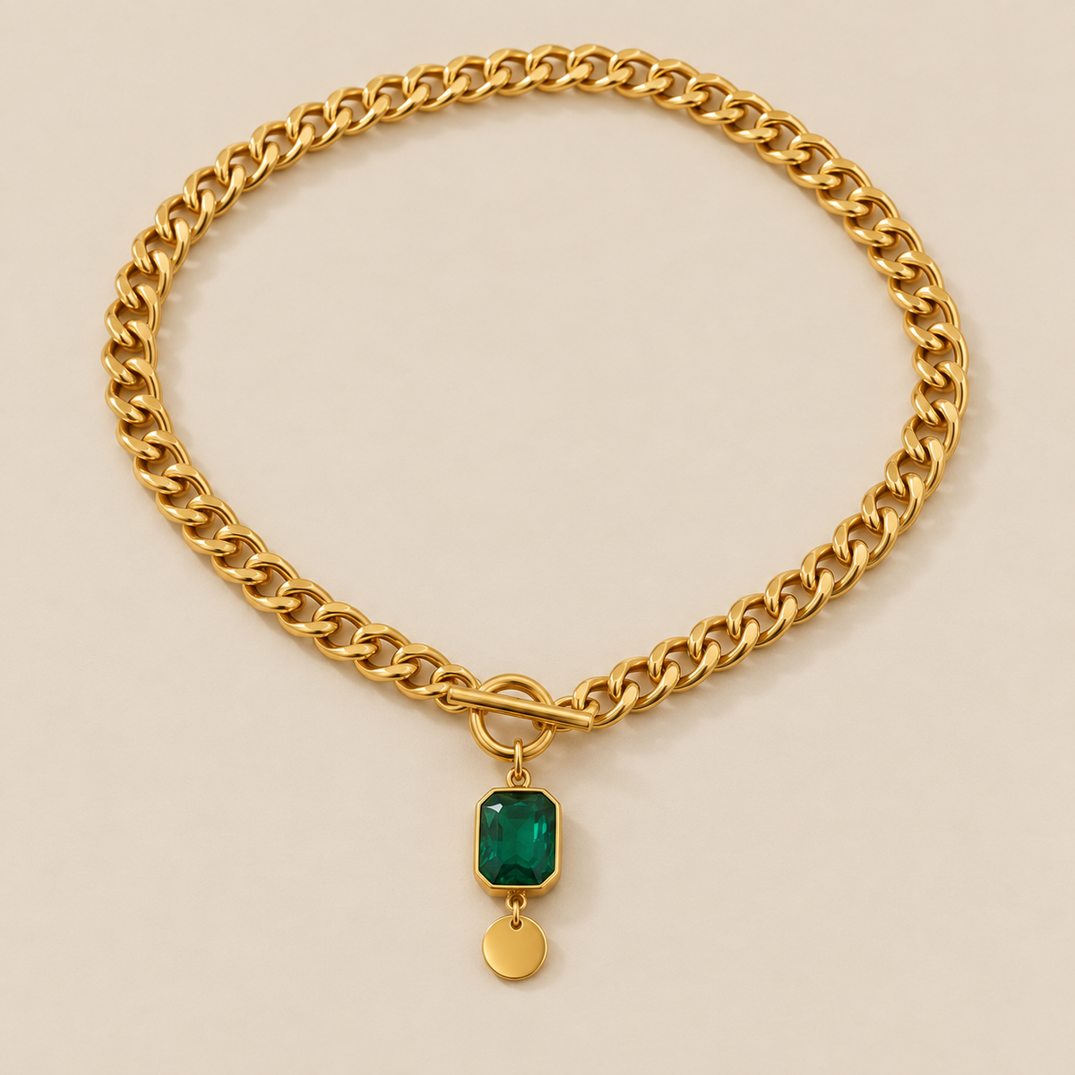 Chunky Chain Emerald Gold Pendant Necklace — cream studio photograph