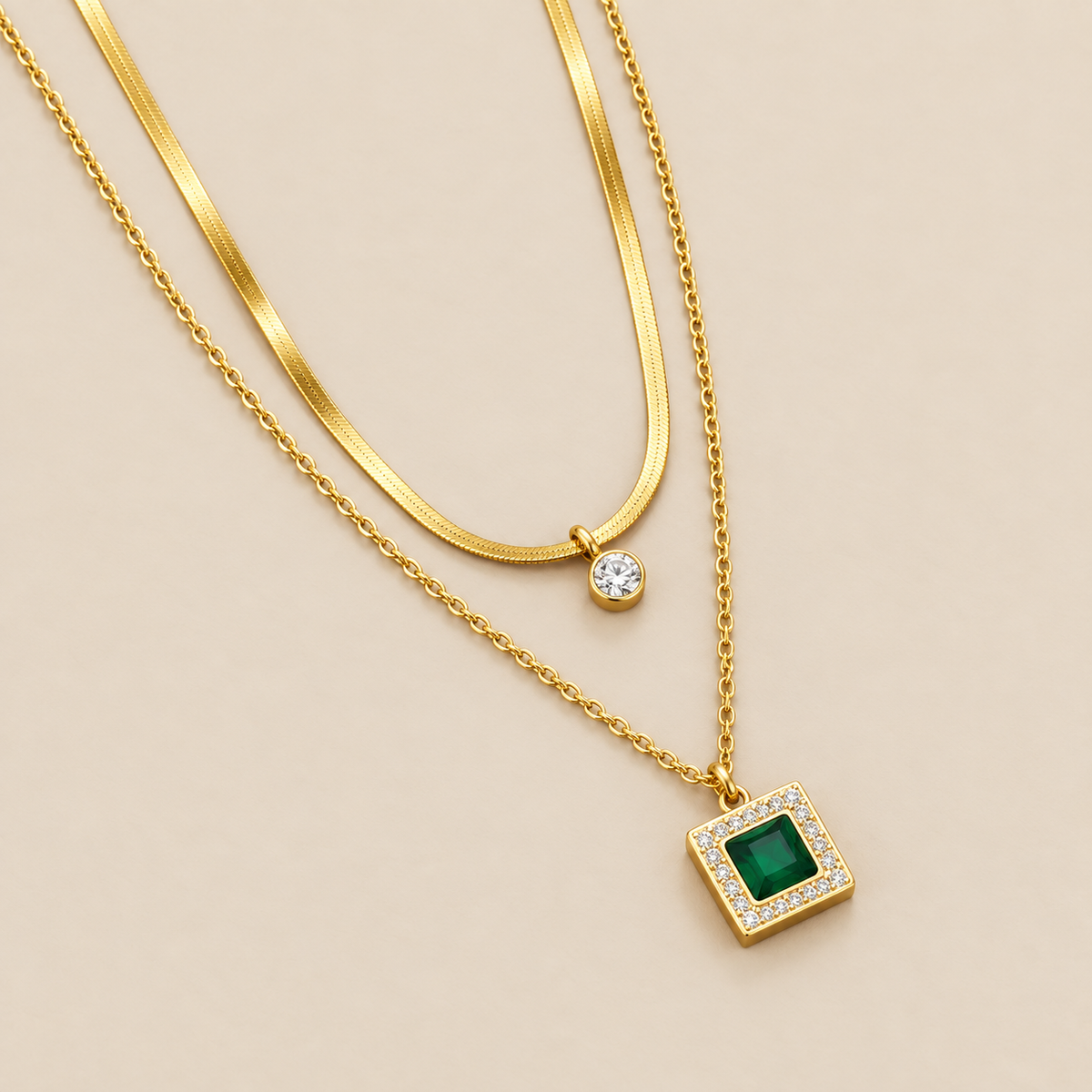 Emerald Layered Double Gold Necklace — cream studio photograph