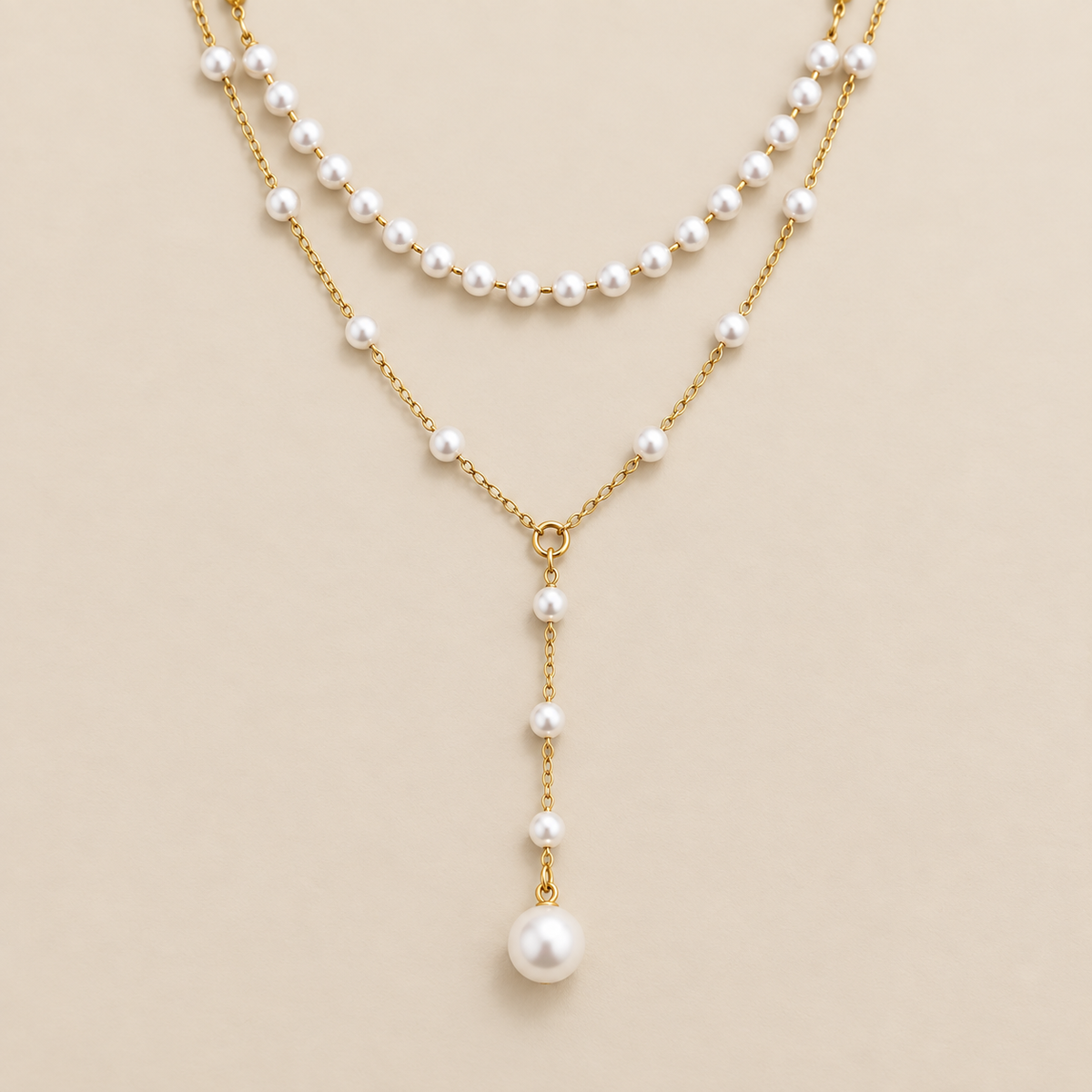 Pearl Y Chain Layered Necklace — cream studio photograph