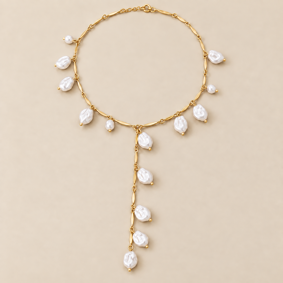 Pearl Cascade Y-Lariat Necklace — cream studio photograph