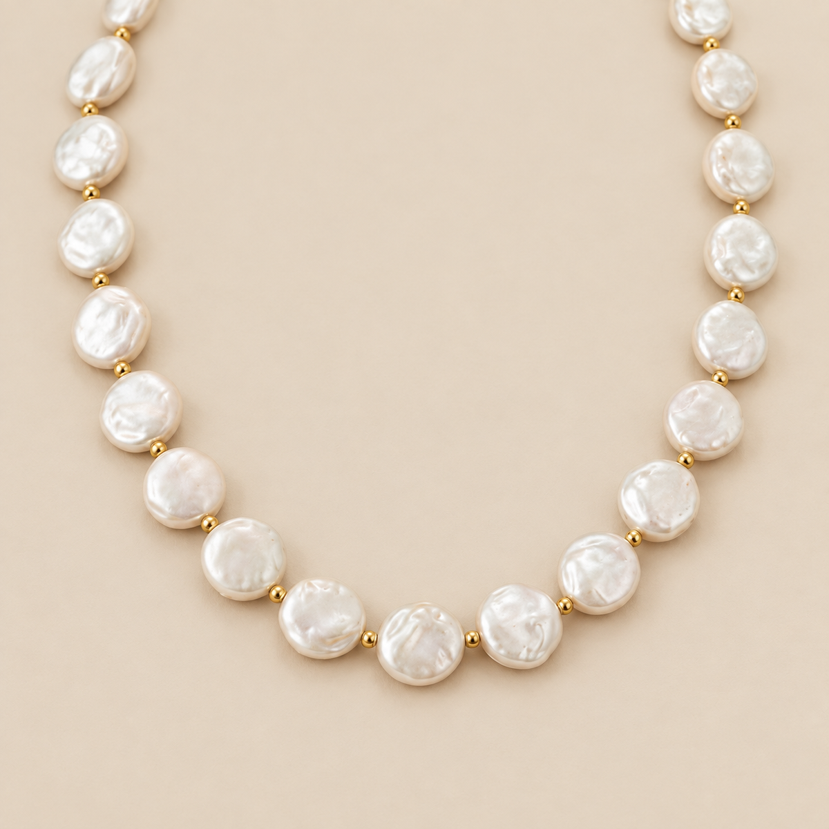 Baroque Coin Pearl Strand Necklace — cream studio photograph
