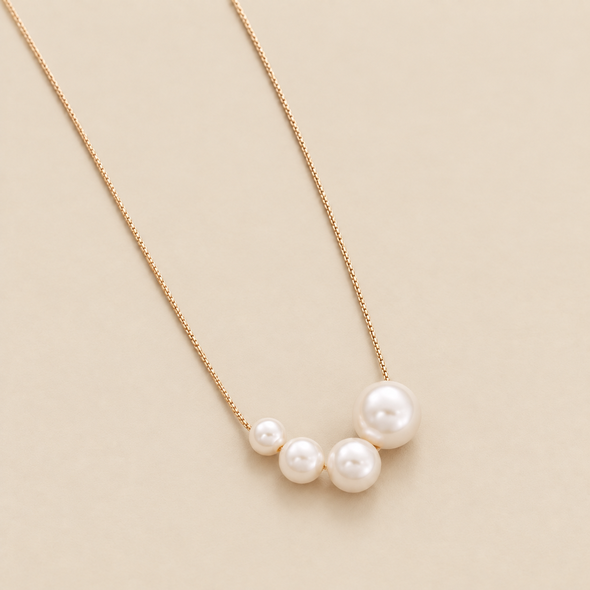 Unique Gold Freshwater Pearl Necklace — cream studio photograph