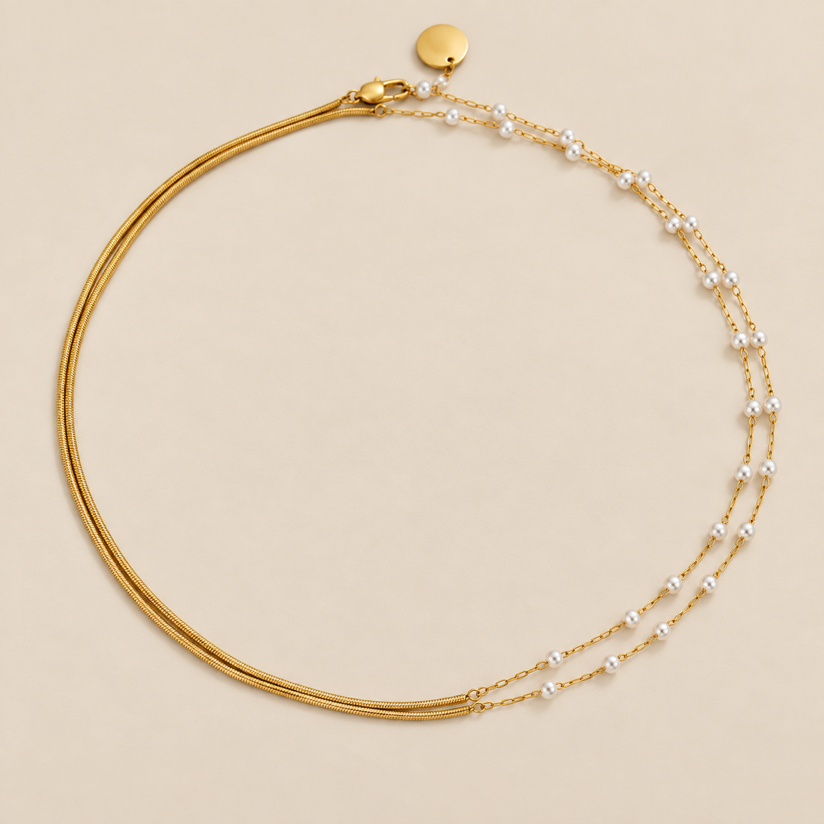 Pearl & Gold Long Chain Necklace — cream studio photograph