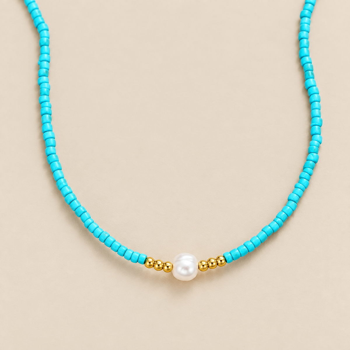 Baroque Turquoise Beaded Pearl Necklace — cream studio photograph
