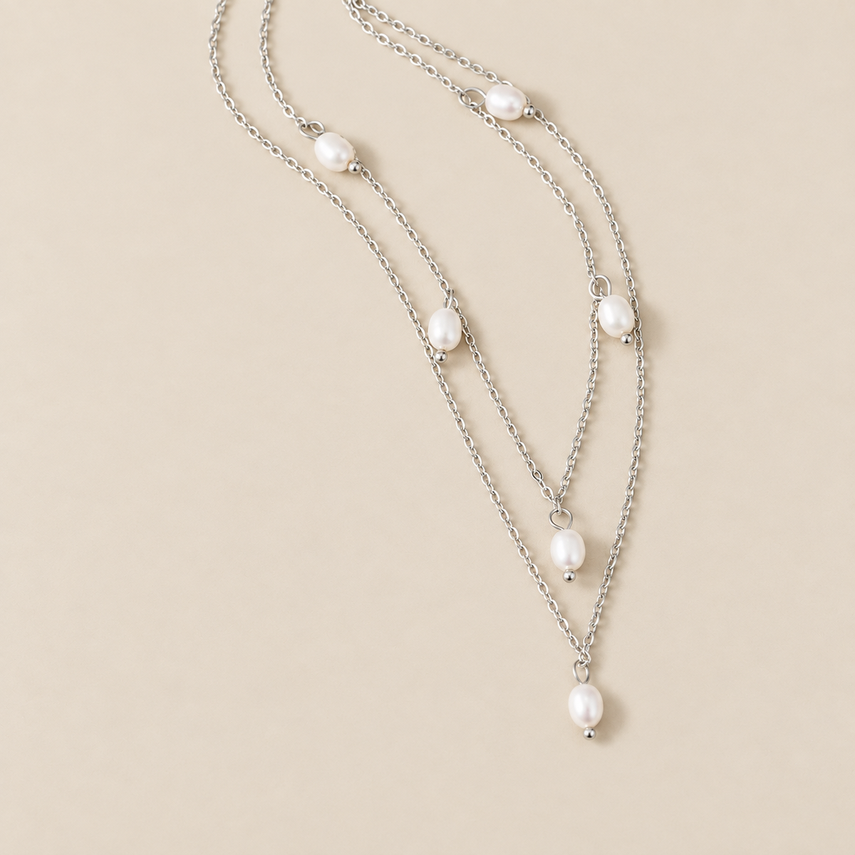 Kayla Pearl Drop Layered Silver Necklace — cream studio photograph