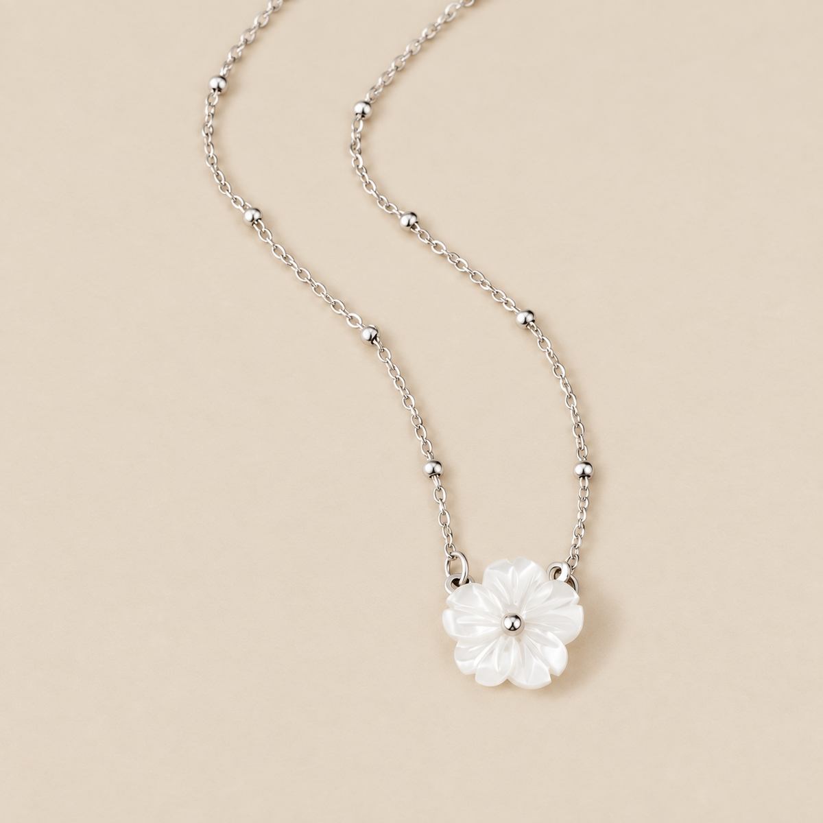 Silver White Blossom Flower Necklace — cream studio photograph