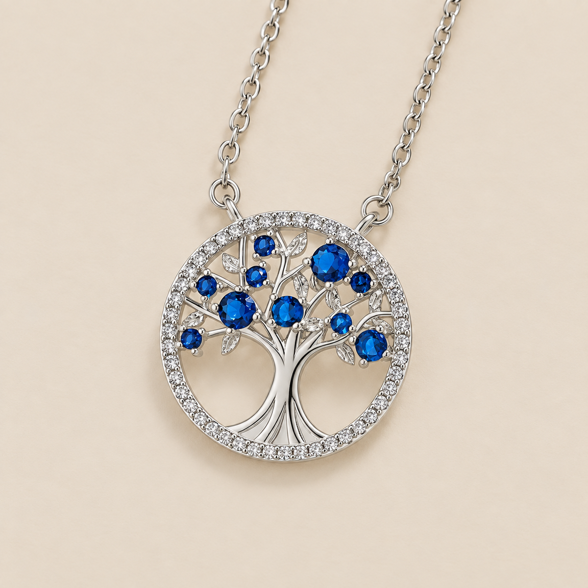 Tree of Life Sapphire Necklace — cream studio photograph